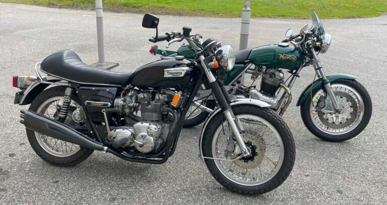 1974 T150 with Slippery Sam headers, Rayguns, alloy wheels and twin disc brakes (L). 1972 Combat spec Commando with 2-1-2 Original Dunstall exhaust, 18” alloy wheels, Norvil front disc, rearsets and Alton electric starter (R).