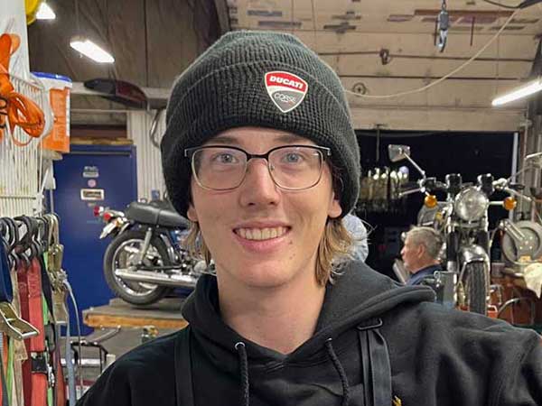 Griffin Smith, intern motorcycle mechanic at Classic Bike Experience in Essex, Vermont